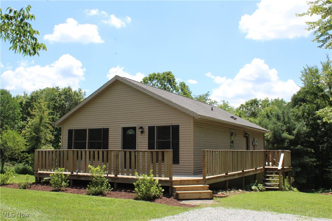 Welcome to 1972 Geneva Drive! This beautifully maintained home is located on 3 lots totaling 1.21 acres in the Lake Buckhorn Community. The home has many updates including a new roof, AC unit, hot water heaters, flooring in multiple rooms and so much more! Featuring 2 full bathrooms, 2 bedrooms with the possibility of a few more in the finished basement. With an open kitchen, living room and laundry room on the main floor. All appliances are included. There is a backup generator and the heated floors in the basement. Come check this one out!