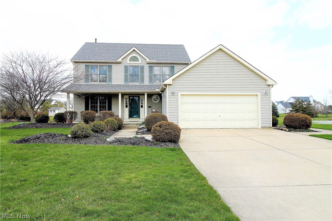 Welcome to this meticulously cared for five bedroom and three and a half bath colonial with a first floor master suite/in-law suite and gorgeous French doors leading to this wonderful open floor plan. This beautiful home offers a spacious living room and dining room. The gorgeous large kitchen which is right off of the dining room has beautiful natural oak cabinets and a large eat in dining area looking right into the family room with gas fireplace and large open window for natural sunlight. First floor laundry area and half bathroom complete the first floor. Then you can follow the extra wide staircase up to the spacious four bedrooms that all have huge closets. Two of the master bedrooms offer en suites And a large full bath accommodates the additional bedrooms. Upstairs bath replaced in 2015. Lower level has huge basement with block windows, plenty of storage space and area to play games. Newly landscaped large backyard with stamped concrete patio to entertain and enjoy relaxing out