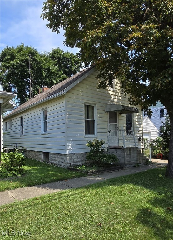 Located just minutes from downtown Sandusky, the shores of Lake Erie, and world-famous Cedar Point, this home features 3 bedrooms-including a spacious third bedroom in the walk-up attic. You'll love the original hardwood floors, complemented by newer vinyl plank flooring for added style and durability. The formal dining room is perfect for gatherings. The fenced side yard provides space for outdoor enjoyment. Interior walls and ceilings were freshly painted just two years ago. Ideal for a first-time buyer, investor, or someone looking to downsize, this is a fantastic opportunity!