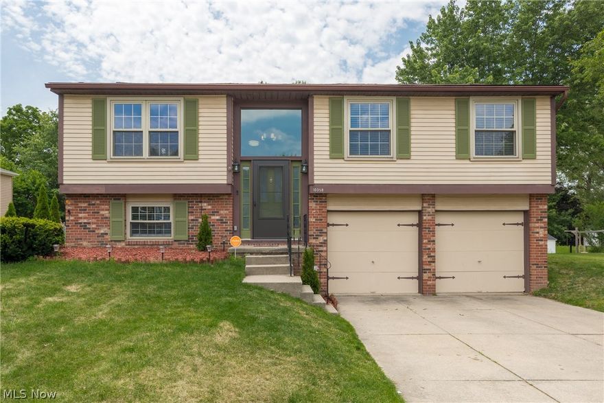 Beautiful 3 bedroom 1 1/2 bath updated bi-level with patio sliders that leads to a stained deck that overlooks a beautiful backyard. Back yard also has brick patio with fire pit.  The entire house has been freshly painted July 2017.  Bamboo wood floors are in the living room, dining room, hallway, kitchen and foyer 2017.  New banisters with wrought iron spindles 2017 in the foyer.   All three bedrooms and recreation area have brand new carpet July 2017. The updated kitchen is only 2 years old with granite counter tops, custom style shaker style white cabinets with soft close doors. All newer stainless steel appliances will remain. Washer and Dryer will remain. Newer double hung windows throughout the house, furnace 2015, central air, hot water tank 2013, Roof 2000, two car attached garage. POS compliant and home warranty included.