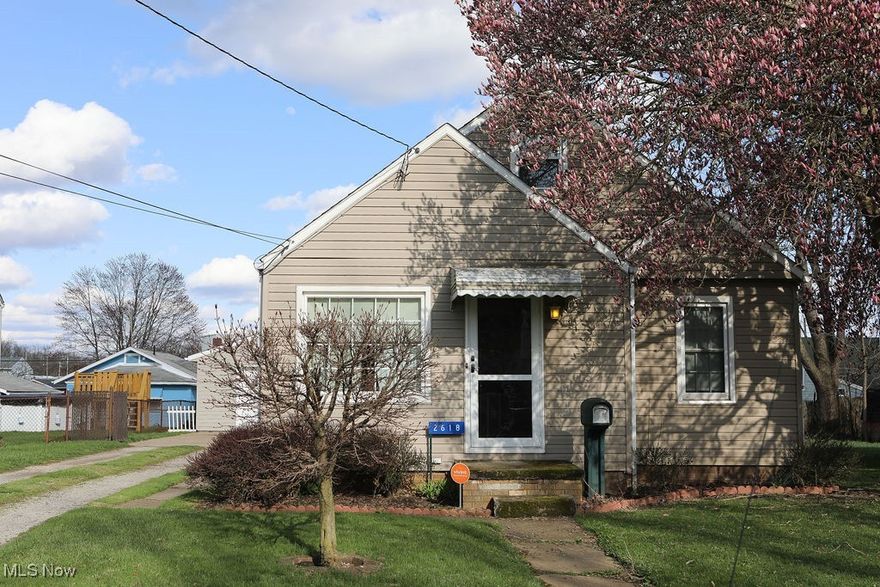 Welcome to 2618 Ellis Avenue NE, a charming 3-bedroom Bungalow nestled in the heart of Canton! This lovely home features 1,125 square feet of comfortable living space, with a spacious first-floor master bedroom, a second bedroom and a large additional bedroom upstairs. Thoughtful updates include a brand-new garage door (2024) and a large living room picture window and front door (2020), bringing in natural light and boosting curb appeal. The full basement offers extra storage or potential living space, while the detached 2-car garage and paved driveway provide plenty of parking. Conveniently located near public transportation, this home is move-in ready and waiting for its next chapter!