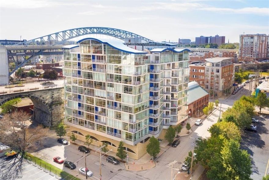 This 2 bedroom 2 full bath condo in Stonebridge Plaza is nestled in the revitalized West Bank of the Flats, and adjacent to Lake Erie. A short walk to the Aquarium, Flats, local bars, restaurants and sports stadiums makes this an ideal location for all. This condo boasts an open kitchen featuring granite countertops, stainless steel appliances, and large island. It opens up beautifully to the family room featuring bright windows showcasing amazing urban views including Jacobs Pavilion and Superior Viaduct. The Master Suite offers a private bath and walk-in closet. The large guest bedroom with ample closet space could easily double as an office. A scenic balcony, in-suite laundry (washer/dryer included) and  24/7 security round out this beautiful condo as an ideal place to live.