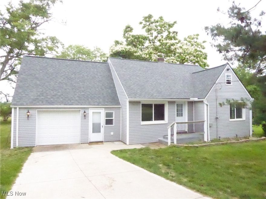 Completely updated Oakwood Bungalow on a 1/2 acre lot!  New roof in 2024, new furnace, tankless hot water heater, a/c, pluming, electrical in 2023.  This home may look small, but it lives large with 3 bedrooms, large 2nd floor bonus room, mud/laundry room, 2 updated full baths, nice size eat-in kitchen and a large finished area in the basement.  Other features include, ceramic tile in kitchen, baths and mudroom, laminate flooring in living room and first flor bedrooms, recessed lighting throughout the home and direct access from the basement to the backyard.  Unique no outlet street street with a semi-rural feel yet with shopping and services right around the corner and equidistant to downtown Cleveland or Akron. Easy access to the Cuyahoga Valley National Park and regionally via I 480 and I 271.