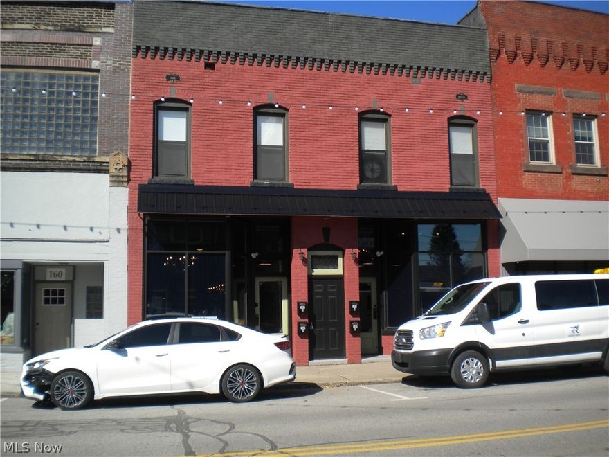 One of Historical downtown Barberton finest! Two commercial storefronts joined as one. This 7392 sq ft gem is a total rehab! 4 second floor apartments that bring in $3700 per month! All single/working men. first floor and apartments have separate utility meters. No expense spared in creating the finest NEW restaurant/ pub/wine bar, Creative rustic design with attention to every detail. YES! newer roof, hvac, plumbing and 3 phase power just brought into building creating many options for kitchen plans. Liquor licenses are available. A stone throw away from beautiful Lake Anna. See Main Street Barberton for more info as well as potential financing, start up funds for new businesses in Historical Barberton! This is a very rare opportunity for one to own building, run restaurant /pub and have the second floor income make your payment! seller can also just lease restaurant /pub/ entire 1st floor for $3000 per month.
