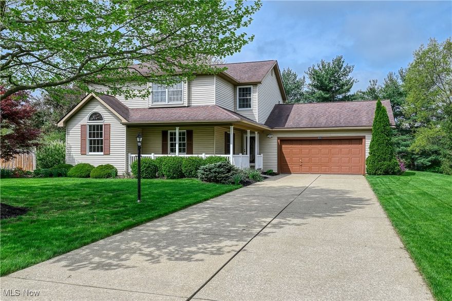 Welcome to this lovely Colonial style home nestled in a beautiful setting in Jackson Township.  This most popular floor plan features an updated kitchen with solid surface countertops and all appliances making meal prep a breeze, a  family room with fireplace, a living room that could also be a first floor den and a dining room.  The second floor is complete with four bedrooms including a spacious owners suite with a remodeled full bath with double sinks and a walk in shower.  The lower level is finished with two rec rooms, a half bath and has plenty of unfinished space for storage.  Updates include new carpeting on second floor (2025), new garage door opener and new walk through door from garage to outside (2024), most rooms newly painted (2024), water heater (2024), central air conditioning (2018), furnace (2014), roof (2009).  Welcoming wrap around front porch, private backyard with extensive landscaping.  This home is priced to sell!  Schedule your showing today!