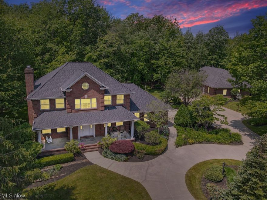 Sometimes when you see a home, you know it is "THE ONE". That is exactly what this home screams to you when you pull down the road, dead ending into this spectacular 5000+SF all brick colonial sitting 2 acres off of the road. Winding past your stocked pond, up the concrete driveway into the circular turnaround, you realize you have ARRIVED! This home has had no expense spared. The first floor has the ability to have an in-law suite complete with living room, bedroom & full bath. The large great room flows nicely into the eat in kitchen with breakfast area & then into the dining room. 1st floor laundry as well as another half bath rounds out the first floor. The 2nd floor features a master suite complete with glamour master bath and walk in closet with gorgeous rich built-ins. 2 more bedrooms plus a full bath complete the 2nd floor. Head up to the 3rd floor and you can have a multitude of options including separating this room to make it 2 bedrooms + and office, or keeping it as one wid