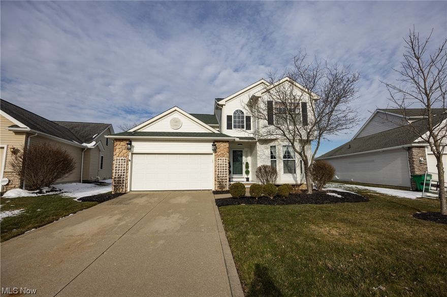 Enjoy the comforts of home with this stylish meticulously maintained colonial. Located in beautiful Woodsong Meadows. Spacious floor plan for comfortable family living. Featuring new flooring, updated lighting inside/out, fresh paint, crown molding, granite countertops, two-story foyer and tray ceilings. First floor laundry, powder room off entry hall. Living room is perfect for gathering and relaxing with a cozy stacked stone fireplace. Formal classic dining room. Every room tastefully decorated, brimming with personality and charm. Step outside through new French doors onto an entertaining deck, Manicured Landscaping Charming garden shed and pair of raised beds. Designer touches throughout. Finished lower level Den is the perfect spot to hang out with an additional office space. Easy commute to Cleveland. Two car garage.