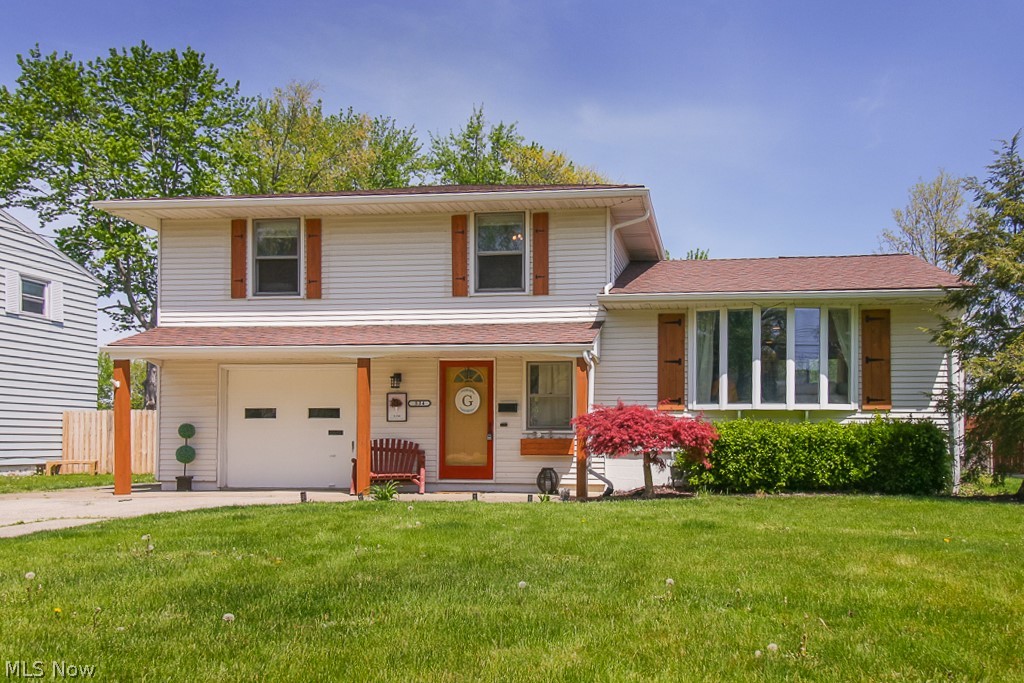 Come see this beautifully updated bi-level nestled in the heart of Elyria! Home has fabulous curb appeal with a new driveway being installed May 17th! Walking in you are greeted with an expansive Foyer that is large enough to be used as a home office or hobby room, an adjacent half bath and patio doors leading to backyard - up just a few steps is a sunlit Living Room with large picture window, hardwood floors, recessed lights - Open floor plan to Dinning area and additional sliding doors to stone patio/fire pit area - Show stopper Kitchen with abundant cabinet space, pantry and granite countertops (all appliances included) - Second floor is an oasis with Master & 2 additional bedrooms, full updated bath and storage - Lower level provides additional living space with a Rec Room and laundry area. Attached 1-car garage, brick patio, deep fenced in yard. SOME UPDATES INCLUDE: Roof approx 7 year; Boiler approx 15 yrs & maintained, new HWT, remodeled Kitchen and baths. Pre-listing, Gene