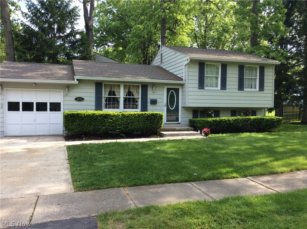 Amazing opportunity to own a beautiful home with many updates in Stow, Ohio. This home has open floor plan with 3 bedrooms and 2 full baths. Updates include new roof and gutters in 2014. The furnace and central air was replaced in 2010 with a 80,000 BTU Trane high efficiency furnace and includes an Aprilaire whole house filter as well as a whole house humidifier. The den offers a marble gas fireplace with unvented gas logs. Off the den is a full bath with large jacuzzi tub. In the kitchen you will find a beautiful porcelain tile floor, 23 cubic ft Kitchen-Aid Refrigerator, Electric range with 30" convention oven a new Bosch dishwasher less than 1 year old. Home has been freshly painted within the last 3 months. Outside the sidewalk and steps were replaced in 2014. Conveniently located near shopping and highway access.