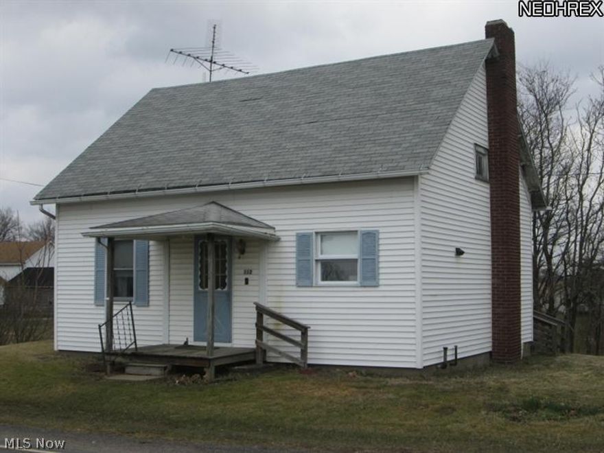 NEW PRICE... Motivated sellers. Nice investment or first time buyers home. Very solid. 10 minute drive to Carrollton or to Scio. Close to Leesville Lake. Both bedrooms and bath with laundry all on the main floor.  The living room has patio doors that lead to a small back patio. Cute eat-in kitchen with oak cabintry. All appliances including the washer & dryer stay with the home. Full walk out basement. Upstairs is an open loft with a lot of storage. Good location to build a garage close to the house. Nice big back yard. Mineral rights were retained by a previous owner so they will not convey with they sale. Taxes reflect a Homestead savings of $279.92. Very affordable living. Nice home for the price.