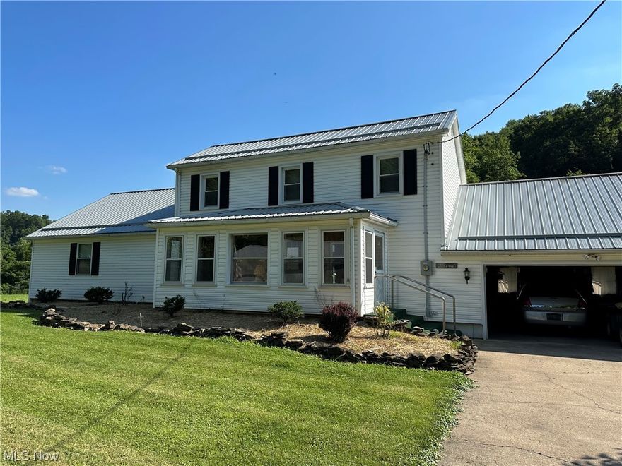 Looking for land + a 4 bedroom home + Pond + Garage + Barn ? Two parcels totaling 71 acres !  This lovely home features 4 bedrooms, 2 Full bathrooms beautiful kitchen 2 car garage, plus a 50 x40 block concrete garage ( with Electric and Heat)  and 32 x 32 Barn.  Two Bedrooms,  full bathroom and Laundry area are on the main level.  Beautiful kitchen into the dining room with a nice sliding glass door onto a covered porch !  Downstairs Living, dining and one bedroom have original Hardwood floors on the main floor with upstairs bedrooms also having Hardwood flooring.  Parcel one : 46.32 acres Parcel 2 : 24.86 acres of land with fenced in property that is partially wooded, pastures and fields.  This property features South Central Electric, Monroe Water, Free gas and private septic ; Nice unfinished basement features a walk out to a nice private back yard with Pond.  Seller will retain mineral rights.
This is a must see property !  Schedule your appointment today !