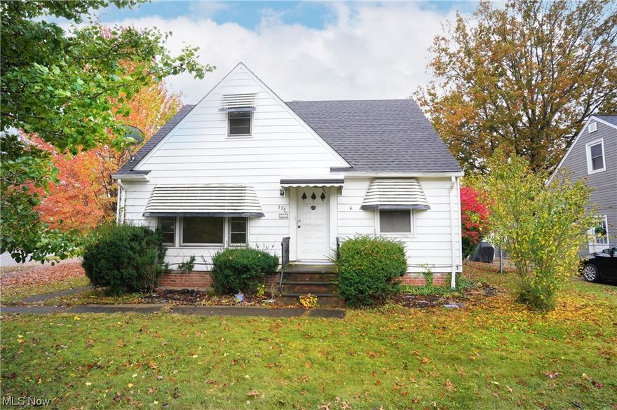Great Willowick Bungalow with oversized corner lot and covered patio. Wonderful opportunity to remodel and update this home to your liking. Spacious Living Room with large picture window letting in natural light and hardwood floors that run through the first floor bedrooms with generous closets. Eat In Kitchen offers corner sink, wood cabinets, appliances, ceiling fan and pantry. Full Bathroom is on the first floor with a tiled floor. Upstair primary bedroom has hardwood floors, multiple closets, built ins  and walk in attic perfect for storage. Full, partially finished basement with recreation room, laundry area with washer and dryer, plus a workshop area. Newer windows through some of the home, Newer high efficiency furnace, hot water tank, and full tear off roof on the house (10 yrs old). Central Air, storage under the basement stairs. Enjoy the big backyard with partial fence. Detached 2 car garage needs rehab - only view from exterior. As-is sale. Sewer Dye test passed. POS Certification in supplements. Bring this amazing house back to life and enjoy the features!