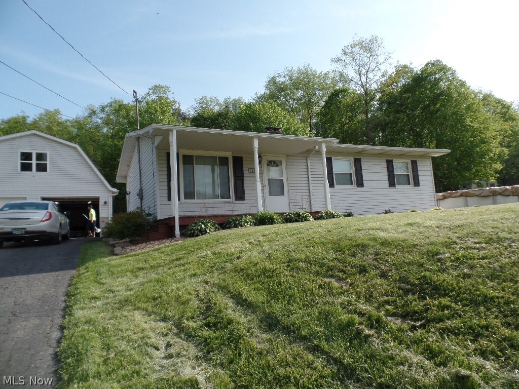 NICE 3 BR HOME WITH EAT-IN KITCHEN, LR AND BASEMENT REC RM; AWESOME 28X38 DETACHED GARAGE W/2ND STORY HAS HEAT, LARGE DECK