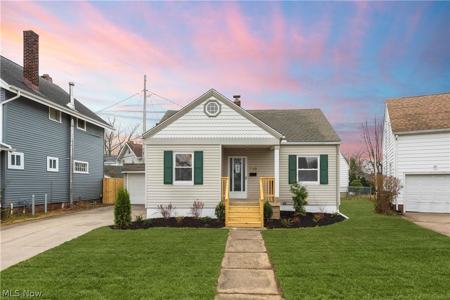 Fall in love with this must see, completely remodeled 3 bedrooms, 2 full bath Cape Cod. Located just seconds from Lake Erie, this prime Lorain home boasts a spacious master bedroom, beautiful full tile showers & floors, freshly painted throughout, and a fully remodeled kitchen. Just like the interior, no page was left unturned with the exterior renovations. Step into the inviting, front facing living room with brand new laminate flooring and decorative original fireplace. The eat-in kitchen comes fully equipped with all new stainless steel appliances, new cabinetry, countertops, backsplash, and flooring as well. 2 of the 3 bedrooms are placed off of the living room and features plush carpeting and sizable closets with easy access to the first floor full bathroom. Up the stairs you will find a vaulted second floor with endless potential for additional entertainment or a master bedroom with ample storage and neutral colored walls. The true gem of this home is the fully finished waterproo