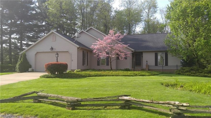 Don't miss out on this enchanting setting! This home is located on Stonewall Street, a hidden treasure in North Canton.  Enjoy the privacy of almost a half acre lot with beautiful landscaping and outdoor living!  This home has so much to offer!  Walk into the huge open great room with fireplace and fabulous lighting!  Formal dining room off of kitchen in addition to large dinette area for plenty of seating!  Library/study included on your way to a grand sun room with views and access to lovely treed yard!  Bedrooms are split in this ranch home with 2 large bedrooms and full bath on one side of home and master suite with full master bath and walk in closet on other side of home!  This is truly a rare find in North Canton.  Call today for a private tour.