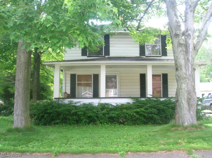 Tons of potential!  Two large bedrooms, large living room and dining room.  Bathroom needs plumbing work. Beautiful hardwood floors.