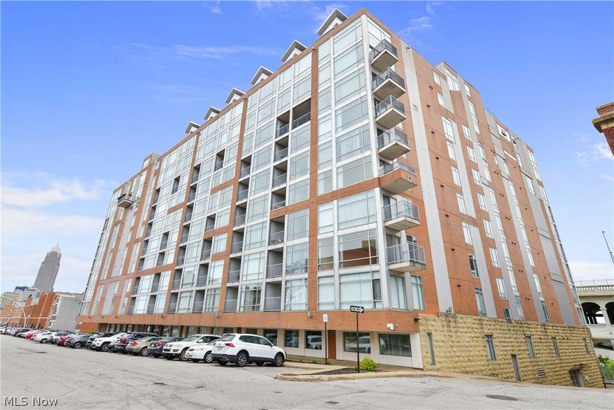 Gorgeous and updated Stonebridge Condominium. Eighth floor unit offering wonderful views of the Veterans Memorial Bridge, Cuyahoga River and Downtown Cleveland. What experience are you looking for from your Urban home? Do you want to be within minutes of The Flats, Edgewater, Whiskey Island, Ohio City, Hingetown, Tremont and Downtown Cleveland? or do you get excited knowing you can step out of the building onto the Centennial bike trail? How about green space just down the street at Heritage Park? All of these wonderful amenities are what you can expect to experience when you move in to this cool City condo. A sleek updated space with new low maintenance luxury vinyl plank flooring, and modern paint throughout. Kitchen offers ample cabinetry, granite countertops and center island with bar seating. Two bedrooms including a master bed with private en suite, the perfect guest or office space, in-suite laundry, balcony off a wonderful open concept great room for entertaining or enjoying yo