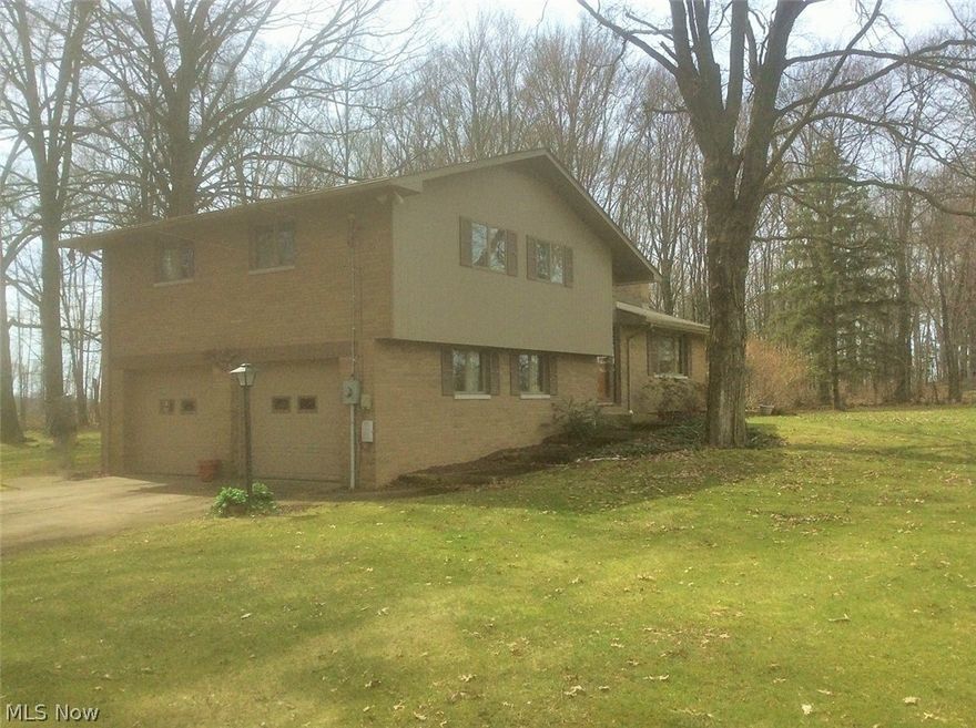 3 bedroom 2 bath split level home on 8 beautiful wooded acres. Enjoy your coffee in the sunroom that overlooks the park like back yard. Nice large shed to store your extra lawn equipment or toys. Cozy living room with fireplace, air conditioning and full basement. Washer, dryer, stove, microwave and refrigerator to stay. This is the one you're looking for. Call for a private showing today!