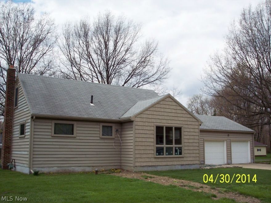 Too Cute! Cape Cod with 2 car attached Garage. Beautiful double lot with mature shade trees! Quiet neighborhood. First floor Master Bedroom & first floor laundry!  New windows and siding, Newer Kitchen, Hardwood floors. Don't wait, call your favorite agent today to schedule a showing.