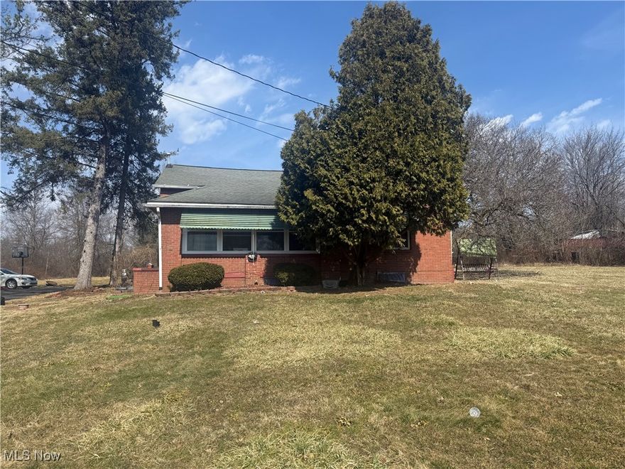 Come make many memories at 4400 McGuffey Rd, Lowellville, Ohio, this charming 3-bedroom, 2-bathroom home offers a perfect blend of comfort and functionality. This amazing property is water front and has 30 plus acres of land!!!  The spacious layout features a well-sized living area with ample natural light, creating a welcoming atmosphere for family and guests. The kitchen is designed for convenience with plenty of counter space and storage. The kitchen features exposed beams. The home also boasts a finished basement with a bar, which is ideal for additional living space, a home office, or entertainment area. The sunroom provides a peaceful retreat to enjoy the surrounding views, while the enclosed porch adds extra space for relaxation or seasonal enjoyment.

Set in a tranquil neighborhood, this property offers the perfect balance of privacy and accessibility. The home is equipped with a 4 car garage, an enclosed porch, and a main floor master bedroom. The sunroom and enclosed porch provide versatile options for relaxation, while the finished basement adds significant value to the home. With its inviting curb appeal and practical features, this home offers an excellent opportunity for anyone looking to settle in a quiet yet convenient location in Lowellville.