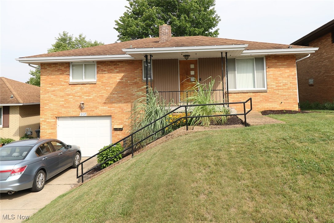Due to no fault of the seller, this property is back on the market—giving you a second chance to make it your home!
This charming three-bedroom, two-bathroom brick home has been beautifully updated and is ready for you to move in. As you step inside, you'll be greeted by the warmth of original hardwood floors that flow seamlessly through the living room, and bedrooms. The upstairs bathroom has been thoughtfully updated with a tiled shower surround and ceramic flooring.
The spacious basement features a large, finished rec room with a wet bar, perfect for entertaining, along with a second full bathroom and new block windows. Other updates include a newer A/C, furnace, and hot water tank for added peace of mind. Outside, you'll find a brand-new deck, ideal for relaxing or hosting guests. The range, washer, and dryer are all included with the home. Close to essential amenities, public transportation, and schools