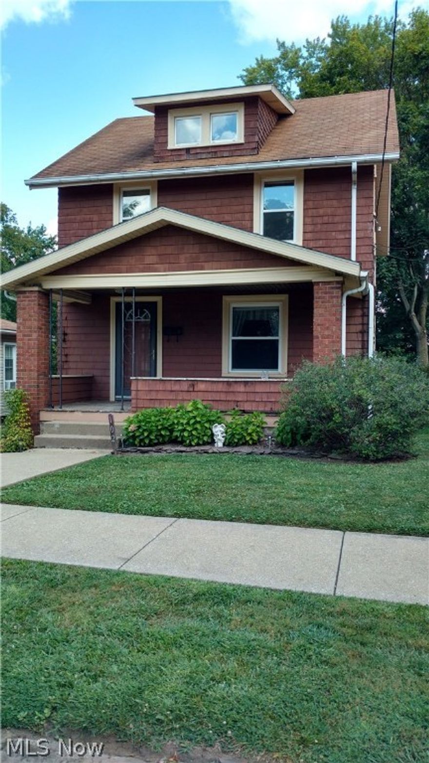 Nice 3 bedroom, 1 bath two story is complimented with original woodwork and lots of character.  Many rooms have been freshly painted along with new carpet and flooring. The 3rd level attic can be finished for additional living space.  You will appreciate the large covered front porch to enjoy those summer days to sit and relax. The basement has a walk out to the backyard. So much to offer for such a great price.