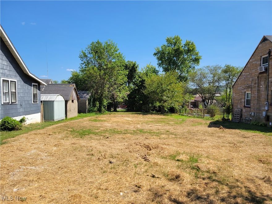 9,000 square foot level residential building lot. Prior home has been razed and is ready for new construction. All utilities are available. Full lot from street to alley.
