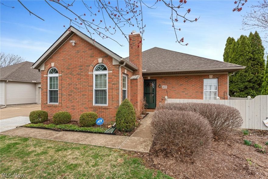 Lovely and well-maintained end unit condo in the highly desirable Hunters Chase neighborhood!  Sunny great room that includes gas log brick fireplace and mantel opens up to dining area and kitchen, Ideal for entertaining family and friends. The kitchen comes fully equipped with all appliances - brand new upgraded range, microwave & refrigerator in 2022, dishwasher July 2021 all stay, including newer washer and dryer. Walk down the hallway to a full bath with walk-in shower, then enter the spacious primary suite complete with a private full bath & large walk-in closet.  Sit on the lanai and enjoy this ideal and serene setting with lots of green space.  HOA includes not only lawn care, snow removal, and insurance, but also includes city water, sewer, and trash removal! Easy to budget for someone on a fixed income! 2 Bedrooms, 2 Full Freshly Painted Baths. 2 car garage has a heated storage room for your convenience, in addition, to pull down access to ample storage in the garage.  All mec