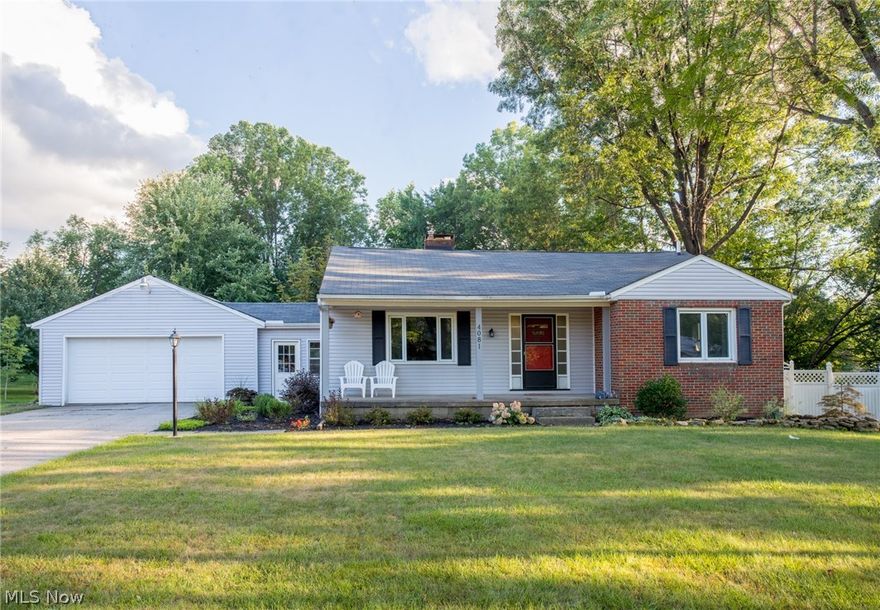 A must see in this extremely desirable stow neighborhood. This wonderful 2 bedroom 1 full bath home had a newly remodeled kitchen in 2012 including your person built in wine rack, ample counter space and plenty of storage! Brand new carpet throughout the main level. Larger master bedroom has updated closets to maximize its use. New air conditioner in 2013 and new furnace and water heater in 2005. Relaxing  breezeway leads to the spacious two car garage. Enjoy entertaining on your back patio while taking the in the view of your very private backyard. Updated finished basement adds at least 600 additional sq ft of living space, a very large laundry room, potential for a third bedroom and is pre-plumbed for a full bath. All you have to do is move in!