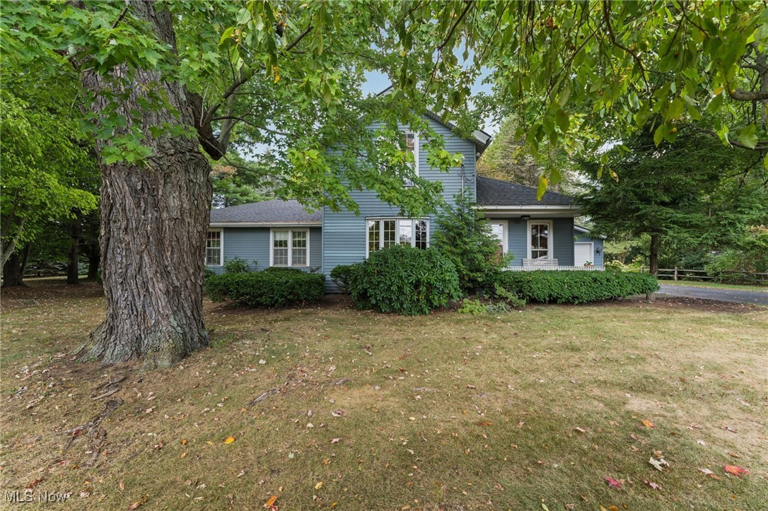 This wonderful historic home situated on a private 2.8 acre lot has so much to offer. The front porch welcomes you into a warm and inviting atmosphere. The smooth floor plan flows to the large open eat in kitchen full of natural lighting and abundance of cabinetry. You will love the granite countertops, walk in pantry, eat in dining area, and vaulted beamed ceilings. From the kitchen you will walk in to the family room offering gas fireplace, cathedral ceiling, 2 skylights, with view to the scenic back yard. The sprawling addition consists of 3 large bedrooms including a master bedroom bath with a custom-built tile shower. The huge full-size basement with a 27' x 24' recreation room with a wet bar, the screen porch, and a 2-tiered deck with benches is perfect for entertaining family and friends. If this isn't enough, walk back to the quality built 64' x 32' gambrel roof barn. Concrete floors, 2 stories, water and electric, make it perfect for any hobbyist. Barn roof replaced in 2023. This home is close to public transportation, shopping, fitness center, restaurants and just minutes from I90. All of this and a 1-year home warranty offering peace of mind. Make your appointment today.