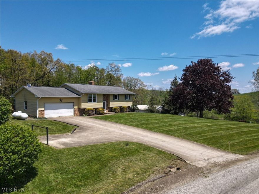 Auction Date: Wednesday, June 14th,2023 starting at 6:00 PM 
Parcel 1: This property, located just half a mile outside of Baltic, is situated on a 1.246-acre lot. The home features 3 bedrooms, 1 full bath, a kitchen, and a living room on the main floor. Additional amenities include an attached garage and a deck at the back of the house for outdoor enjoyment. The lower level contains a family room, another full bath, a summer kitchen, and a laundry area. The exterior of the home is low-maintenance, with a shingle roof, vinyl siding, and a brick band. The property is equipped with a water well, septic system, and a wood burner as the primary heat source. Additionally, there is a 28'x28' detached garage with a 28'x55' attached pole building, which includes 3 box stalls. A newer dog kennel on the property offers in-floor heating and 8 runs. This parcel has 304’ of road frontage on TR 84.