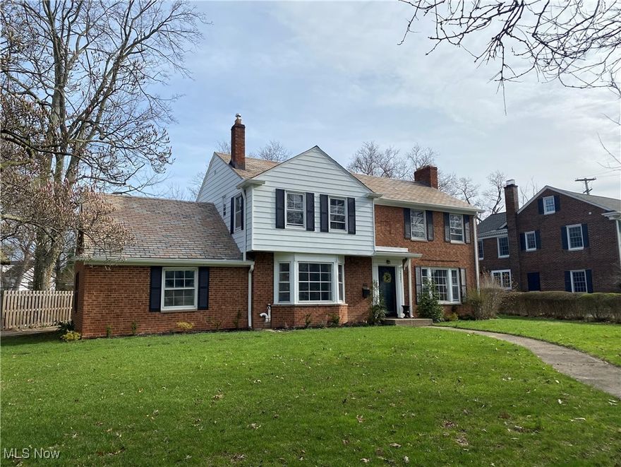 STUNNING, BEAUTIFUL AND OPEN 4 BEDROOM, 2 FULL & 2 HALF BATH TRADITIONAL BRICK COLONIAL HOME COMPLETE WITH PRISTINE HARDWOOD FLOORS THROUGHOUT, FINISHED LOWER LEVEL, 2-CAR ATTACHED GARAGE & LARGE/GORGEOUS/PRIVATE FENCED-IN REAR YARD IN AWARD WINNING SHAKER SCHOOL DISTRICT AND .6 MILES (2 MINUTES) TO HISTORIC SHAKER SQUARE/ALL AMENITIES. HOME FEATURES INVITING DENTAL MOLDED ENTRANCE/4.4 X 3.4 TILED VESTIBULE W/ COAT CLOSET/8.7 X 7 HARDWOOD FOYER; 23.1 X 15.2 GRAND HARDWOOD FLOOR LIVING ROOM W/ WOOD-BURNING FIREPLACE (W/ WINDOWS ON EITHER SIDE), COVE CEILING, & LARGE PICTURE WINDOW TO RIGHT OF FOYER; BAYED 14.8 X 13.10 HARDWOOD FLOOR DINING ROOM W/ COVE CEILING TO LEFT OF FOYER; DREAMY 23.1 X 10.1 GRANITE EAT-IN KITCHEN (INCLUDES 10 X 6.10 BREAKFAST NOOK) W/ MOSAIC BACKSPLASH, WINDOW ABOVE SINK LOOKING OUT BACK. PANTRY & ALL APPLIANCES (6 BURNER GAS STOVE, MICROWAVE, FRIG, DISHWASHER); TRANQUIL 12 X 8.8 OFFICE W/ WOODED WALLS & CEILING, BUILT-IN BOOKSHELVES, LARGE CLOSET & LARGE WINDOW LOOKING OUT BACK; LARGE HALF BATH INBETWEEN LIVING ROOM & EAT-IN KITCHEN COMPLETE THE 1ST FLR. HOME INCLUDES HARDWOOD STAIRS W/ WROUGHT IRON SPINDLES TO HUGE 16.9 X 14.8 HARDWOOD OWNER SUITE W/ CHAIR RAIL, TWIN WALK-IN CLOSETS & 4 WINDOWS (SUN COMES DIAGNALLY INTO ROOM IN THE A.M.) & A GLAMOUR OWNER BATH (2-PERSON TILE SHOWER, BEAUTIFUL VANITY, TUB/SHOWER COMBO & WATER BOWL; 16.4 X 10.2 HARDWOOD BED #2 W/ LG CLOSET; 16 X 12.8 HARDWOOD BED #3 W/ LG CLOSET ACCESS TO FULL BATH; 14 X 11.3 BED #4 W/ LARGE CLOSET & 3 WINDOWS. MAGNIFICENT 14.8 X 8.5 BALCONY AT TOP OF STEPS/LANDING OVERLOOKING SURREAL/PRIVATE BACKYARD. FINISHED LOWER LEVEL HAS 23 X 18.3 REC ROOM WHICH INCLUDES 2 DAYLIGHT WINDOWS & 22.7 X 20 LAUNDRY/UTILITY AREA. TONS OF NATURAL WOODWORK & CHARM THROUGHOUT. BRAND-NEW & RECENTLY SERVICED: FURNACE, C/A, AIR CLEANER AND HUMIDIFIER. SELLER OFFERING UP TO $5,000 TOWARDS BUYER(S) CHOOSING WITH ACCEPTABLE OFFER. SIDEWALKS & STEET LAMPS LINE THE STREETS. MAKE IT YOURS TODAY