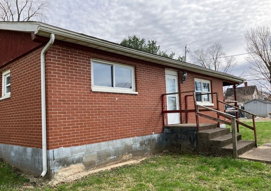 Come check out this 1 level home with 2 bedrooms and 1 bath that  has a convenient open floor plan! The exterior is low maintenance brick. There is a ramp leading from the parking area to the kitchen door or on to the side deck! Call your Realtor today for your showing!