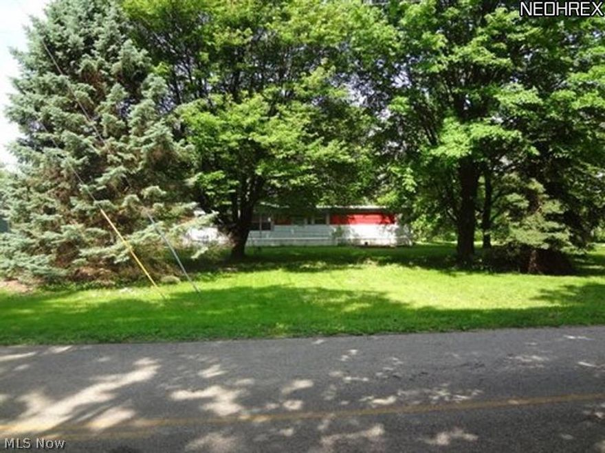 Buildable wooded lot with rural water.  Mobile home situated on one lot.  195 ft of frontage.  Lots grand fathered in.  Septic permit needed before building permit will be issued.  Current setbacks must be used.
