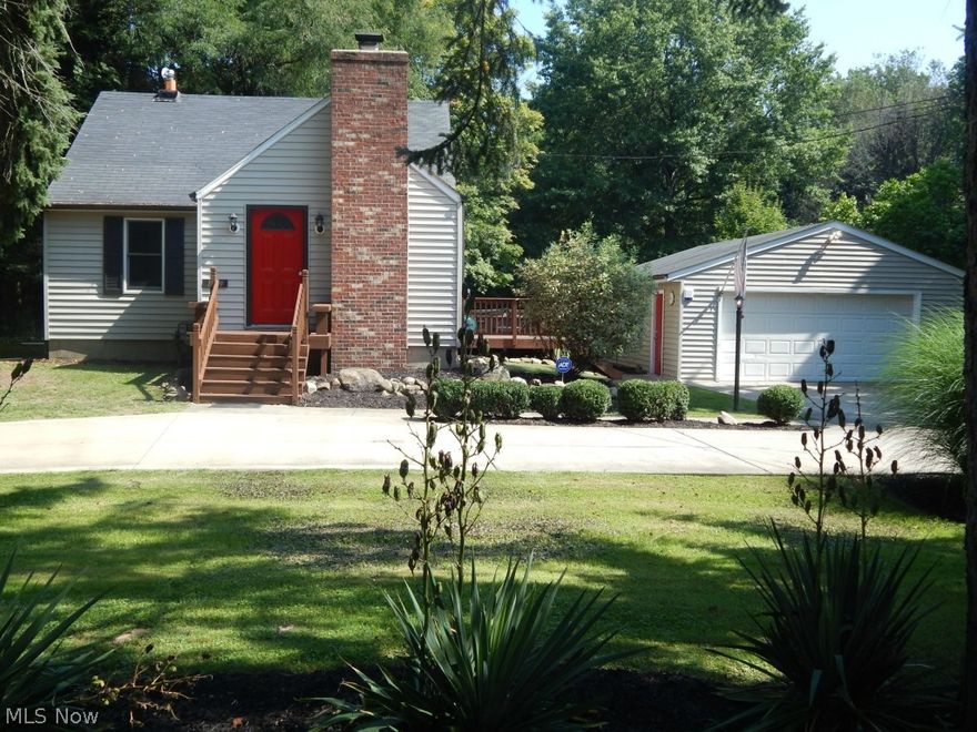 Take a look at this "cute as a bug" bungalow, it's completely redone and move in ready.  It features easy to care for pergo floors throughout the main floor.  There's a bedroom and a full bath on the main floor and a bedroom and full bath upstairs.  The kitchen has beautiful stainless steel appliances.  There's a cozy living room with wood burning fireplace.  The full basement has been professionally waterproofed and the warranty transfers, it comes complete with the washer and dryer.  Enjoy the great outdoors on the half acre lot, there's a handyman's dream garage with cabinets and plenty of room for a work shop.  There's also a huge deck. The driveway is paved and circular.  There's nothing left to do.