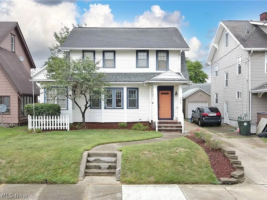 800 Bellflower Ave SW -- an updated, yet charming 3 bedroom colonial boosting 1,446 sqft. TURN KEY! Inviting curb appeal with a covered front entryway which leads you to the foyer. Wood floors throughout with heightened 9-foot ceilings on the main level. Spacious living area with lots of windows + an updated built-in fireplace -- truly a statement piece! Sunroom located right off of the living area, with so many window & light! Roomy dining area with built-in cabinets + a double exterior door leading you to the fenced in backyard. Updated kitchen with stainless steel appliances, ample cabinets with a wine/coffee bar area! Upstairs you'll find the 3 bedroom, updated full bathroom + access to the attic (stairway entry) ideal for storage or finish it to your liking which will create even more living space! Crown molding throughout most of the house. Full basement (partially finished) with washer + dryer hookups & a utility sink. 1 car garage. Canton Schools. Conveniently located close to