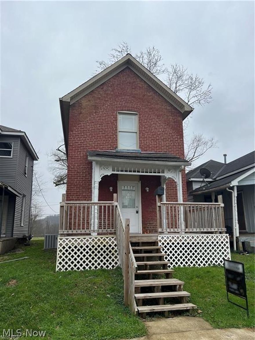 Adorable updated home on a quiet street! 2 bedrooms upstairs and main floor laundry and bathroom. Decks on both front and back along with off street parking in the back. Lots of updates including: HVAC, windows, roof, plumbing, flooring, and drywall. Could be used for a single family home or rental. Priced to sell! Washer and Dryer will remain with the home.