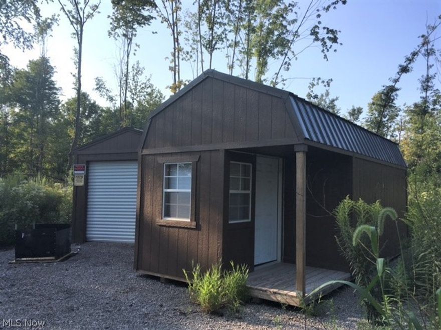 Hunters Dream!   16+ Acres of Secluded Wooded Acres with Abundant Wildlife and a Small Creek.  Property includes a shed, garage, gravel drive.  No utilities on property.  Nice and Private with no close neighbors.