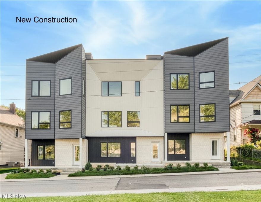 Introducing 'Edgewater South', a Fully Completed three-unit townhome collection with No HOA Fees! These move-in ready elegant townhomes with Pella Windows are located at the top of Edgewater Hill & W 74th street, just north of Detroit. The exterior of these homes have a pleasing modern aesthetic that fits perfectly within the neighborhood. This corner unit offers an abundance of living space! The private ground level entry is met by a spacious bonus room/office or home gym area & attached two-car garage. The second story offers a modern open concept kitchen, living & dining space with generous finishes including quartz counters with matching quartz backsplashes, premium kitchen cabinetry & energy-star rated stainless appliance package. A powder room along with dedicated dining and living space complete the second floor that is finished in premium LVT flooring. Upstairs the third story offers a loft space perfect for a home office! The owner's suite is completed with a walk-in closet & private en-suite owners bath with Quartz vanity and matching backsplash with double sinks & a large walk-in tile shower. A secondary guest bedroom, additional full bath with shower/tub combo & dedicated laundry space complete the third story. The fourth story offers access to your private oasis. This roof deck is the perfect place to unwind after a long day while enjoying a view overlooking the Detroit Shoreway neighborhood, Lake Erie & Cleveland skyline! This collection WILL meet the eligibility requirements to obtain the current city of Cleveland Full 15yrs of Tax Abatement. Don't miss out on this opportunity! Schedule your private
showing today!