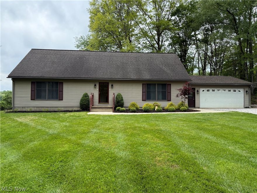 Uniquely, quiet location at wonderful Lake Buckhorn which features a near 2 mile long lake for skiing, fishing, swimming, etc. This home sits on a very FLAT LOT which is something that is quite unusual in the Lake Buckhorn community. The peacefulness and serenity of this home, especially the rear yard…it’s simply wonderful. With bushes across the back, untouched wooded lot to the north of the house, (part of the property) and a 71 acre farm to the rear, it is heavenly. This home is located on a street that is a loop street which has ONLY 5 Homes and a serene ravine to the south of the loop.  If you yearn for quiet solitude, combined w the comforting security of having neighbors nearby but not too close, this is a home that you should look at before it’s gone. It lives larger than looks. The home features a 1st floor master suite w en suite bath & walk-in closet. There is a 2nd FULL Bath & a den/bedroom on the 1st floor along w the large Eat-In Kitchen w ISLAND & nice sized living rm. The windows of nearly all of rooms feature views of nature not neighboring homes. Upstairs, there are 2 bedrooms, 1 large & 1 extremely large featuring two wide closets and a FULL Bath + large area that could be a computer/study room between the 2 bedrooms. It’s a 4 BEDROOM, 3 FULL Bath home though the one bedroom (w ADJACENT FULL BATH) on the 1st floor may be used as a den. The kitchen is spacious & extremely nice w the popular WHITE Cabinets, ISLAND, large dining room-sized Eating area w sliders out to the deck and terrific views from the window over the kitchen sink and the sliding doors in Eating area. I’m sure the new owners will spend a great deal of time on the 20 x 10 deck in the rear of the house off of the Eating area. It is a very serene, peaceful & beautiful spot to spend your time w your morning coffee or relaxing in the evenings. There is a very spacious 24x24 garage off the laundry room & FULL unfinished basement waiting for your plans to fit you best. Call today