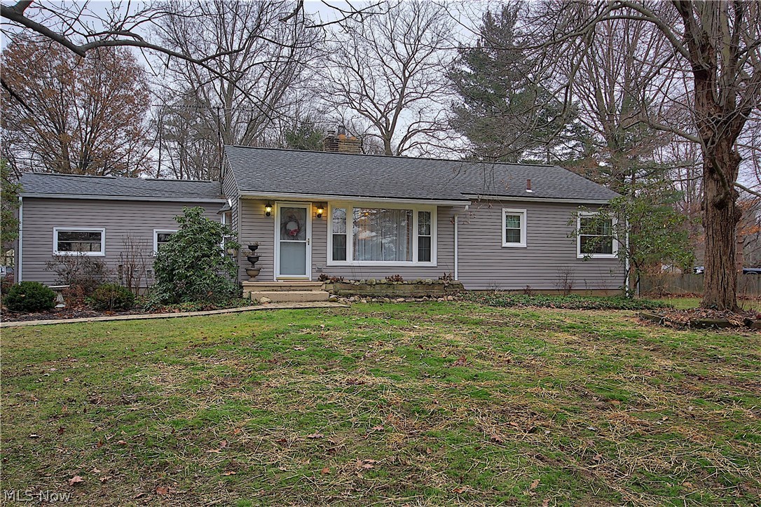 Updated ranch in quiet Norton neighborhood. Large private fenced back yard. The home has a newer kitchen with , maple glazed cabinets, large pantry, and solid surface counter tops. For those cold winter nights there are 2 wood burning fireplaces and a beautiful wood floor in the living room. The basement has been partially refinished and has a updated laundry room. Most of the windows have been recently replaced along with the roof. If you have been looking for a house with charm, this one is for you.