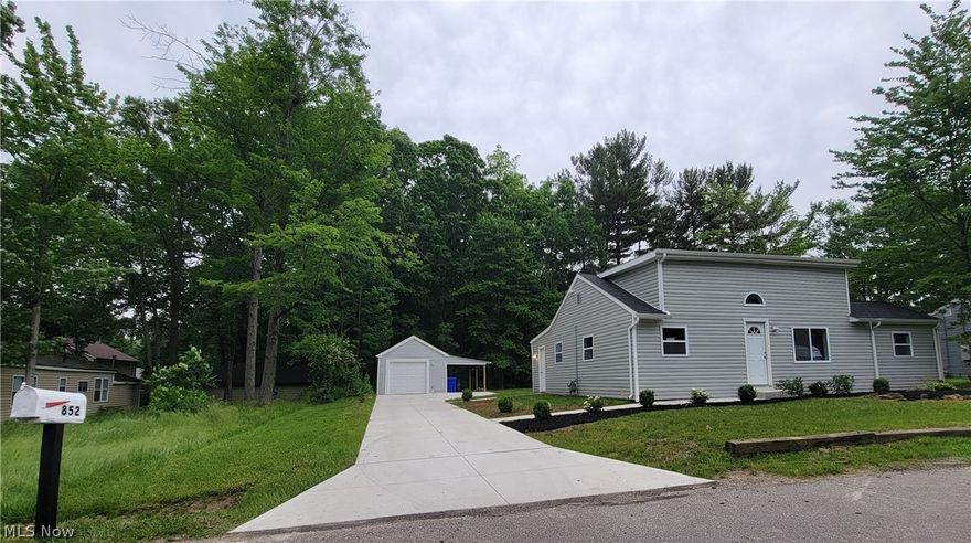 Wonderfully-renovated 3 bedroom ranch with 1150 sq ft, true 1-floor living! Open floor plan with living room and eat-in kitchen with breakfast bar seating area, all with vaulted ceilings and lots of natural light. Kitchen remodel in 2024 with new cabinets, granite counters, new fixtures, and luxury vinyl plank flooring that flows throughout the entire home. 3 spacious bedrooms, plus a fully-updated bath with new tub/shower, vanity, and fixtures. Other features: 1st floor laundry, vinyl replacement windows, high-efficiency furnace. Tankless hot water heater installed.(all renovations done '23-24), vinyl siding for years of worry-free maintenance, concrete driveway, new roof ('23), plus a 1-car garage and carport. Convenient location near shopping, schools, restaurants, just minutes to freeway access. Aurora Schools!