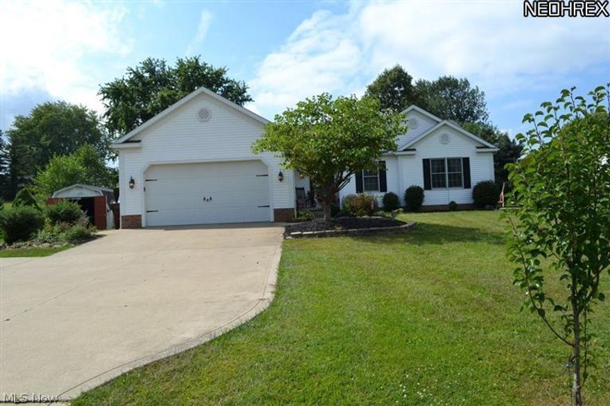 Enjoy scenic views and quiet living in this 2000+ sq ft ranch home in Hartville-Lake Local Schools. Recently updated kitchen with granite counters, hardwood floors and stainless steel appliances. Plenty of space for the whole family in the large living room with vaulted ceiling and gas fireplace. Large master bedroom with walk-in closet and attached master bath with dual sinks and huge tile shower. Large bedrooms with plenty of closet space and 12x12 office that could be 4th bedroom if needed. An additional 600+ sq ft finished basement with second fireplace and large unfinished portion with plenty of storage. 2 car attached garage with heating unit, hot/cold water and drain. Outdoor shed, invisible pet fence and deck off back.