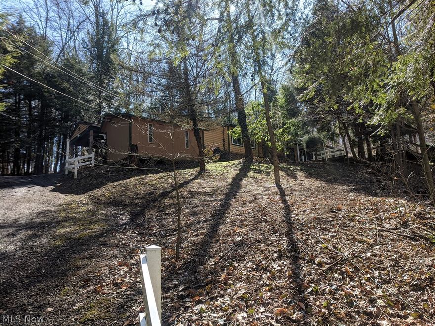 This is a beautiful 25+ acre property!  Secluded in the hills of northwestern Wayne County, this property really offers a lot to people who love the outdoors.  From hunting, to riding the trails in the woods, to camping or having a picnic at the pavilion with your friends, to driving golf balls on the electric line right-of-way, there are many ways to utilize this property.  This is a property that you will need to hike around to really appreciate.  Wear your hiking boots and come ready to explore!!  The seller is willing to sell the oil/gas rights as well.  It is up to the buyer to do due diligence on researching these rights to their own content.