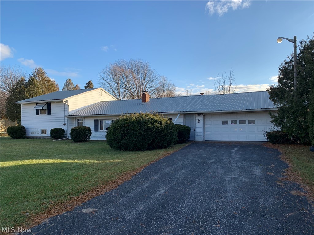 4 bed 2 bath home situated on .74 acres. Interior Features Include- large eat-in kitchen, living room with hardwood floors and a wood-burning fireplace, full bath on the main level, one bedroom on the main level, lower level unfinished, 3 bedrooms upstairs along with a full bath, nice sunroom, lots of storage, some updated windows, and More! Exterior Features Include- paved drive, 2 car attached garage, one car detached garage, 30x 40 pole building with loft and 12' eaves, fruit trees, and more! Case number 412-591884. HUD Homes are sold AS-IS!