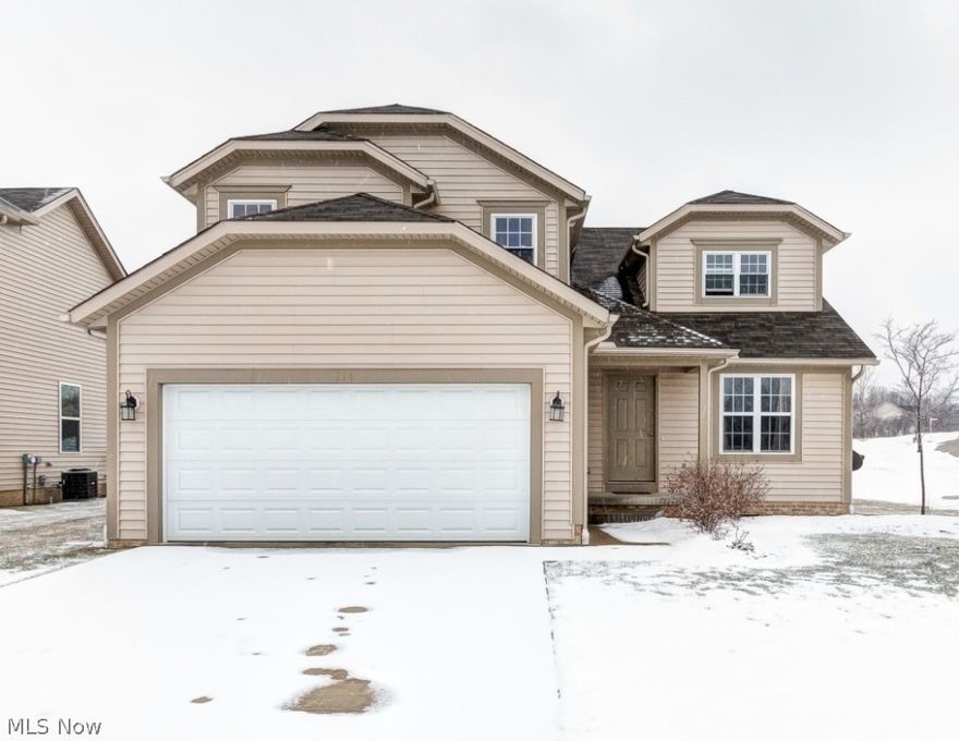 Stunning, newer home overlooking a beautiful pond!! Grand entryway leads to a 2 story family room with a full wall of windows. Hardwood floors throughout foyer & formal dining room. Spacious eat in kitchen with patio doors leading to a  deck.Unwind from it all while enjoying the serenity of the water & quiet cul de sac location. 1st floor laundry, glamour bath & full basement! This is a cluster home community with a very low maint fee  that includes all yard work! Quality built home!!