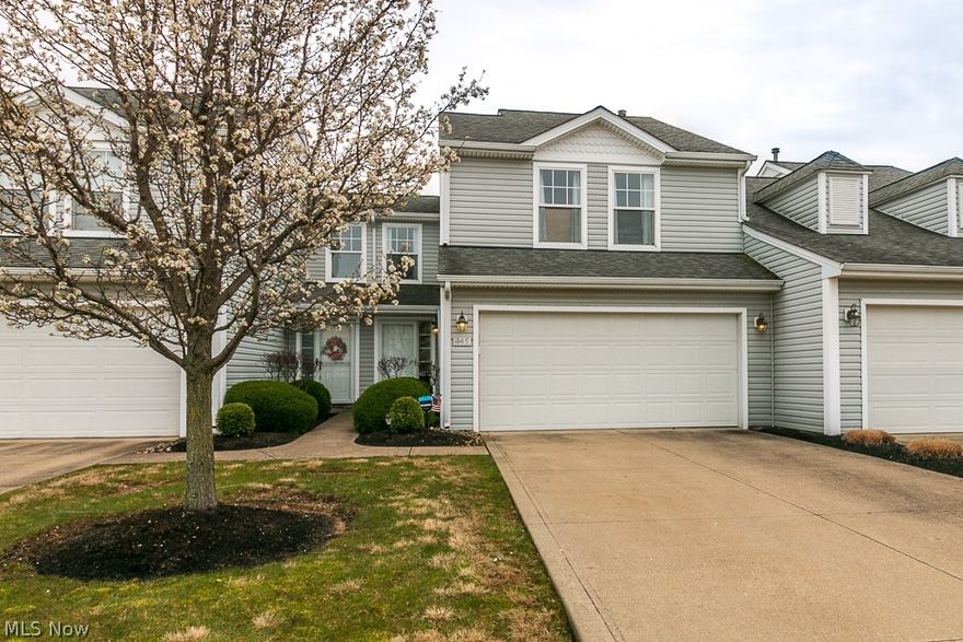 Welcome home to this inviting townhome nestled in the serene enclave of Tradewinds Villas. Just moments away from the lake, this residence boasts 3 bedrooms and 2 ½ baths. Freshly painted walls greet you throughout, complemented by newer carpeting. The first-floor living area exudes elegance with gleaming hardwood floors and a cozy gas fireplace framed by a charming white mantle, creating a captivating focal point. The completely updated kitchen offers ample cabinetry, gorgeous Quartz countertops, all new stainless steel appliances and seamlessly flows into the dining area perfect for gatherings. Convenience is key with a first-floor laundry, pantry space, and a half bath. Journey upstairs to discover three spacious bedrooms and two full baths, including a master suite adorned with vaulted ceilings and an ensuite bath. Outside, a private backyard oasis awaits, overlooking a tranquil wooded lot and featuring a welcoming patio. Enhanced with neutral tones, updated fixtures, and timeless hardwood floors, this home is a rare gem!