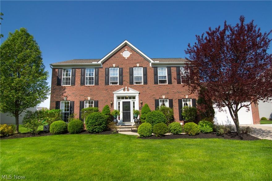 Meticulous Colonial Home in the “Hunt Club” neighborhood is certain to impress!  Fantastic curb appeal and totally updated in today’s fresh colors throughout.  Open floor plan compliments today’s lifestyle.  Spacious kitchen with wood floors, newer granite counters, stainless steel appliances and island… opens to both family room with stone fireplace… and morning / breakfast room with loads of windows.  1st floor office / den.  Formal dining room.  1st floor laundry room.  Large master suite with walk-in closet and glamour bath.  Basement offers finished recreation room with theater, half bath, workshop area and loads of storage.  Deck with exterior lighting and brick paver patio with pergola is the perfect place to enjoy the outdoors.  Storage shed.  Concrete driveway offers additional parking space.  Don’t wait… call today!