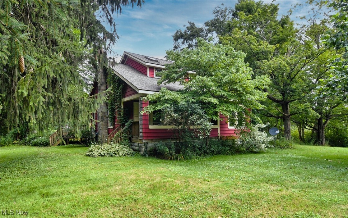 So much potential at this very special property, which includes a main house, separate ranch-style cottage home, and a huge garage with artist's loft or office, all ready for renovation. The main house has hardwood floors, a large kitchen, a living room with fireplace, a bedroom and full bath on the first floor. Upstairs there are two bedrooms with skylights, and an area for lounging or office. The cottage needs a complete renovation and hookups to septic and well. It is designed as a 1 bedroom 1 bath with kitchen, dining room and a family room addition. The huge garage is perfect for storing all your tools, recreation equipment, and cars, and features an upstairs loft with windows - perfect for artists studio or office. All this on over 2 acres of beautiful trees and lawn! Furnace in main house 2015 is prepped for A/C. furnace in Cottage 2015. All roofs 2015. Main house has some replacement windows.