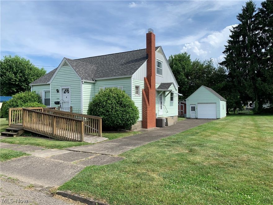 1.5 story bungalow situated on three city lots total lying .4350 acs m/l.. Offering entry foyer with two closets, nice size living room with decorative fireplace, eat-in kitchen, two bedrooms and full bath in the main level. Second level offers a third bedroom with built-ins.  Full basement with family room set up, L-shaped remaining basement for laundry, storage, etc.  Detached one car garage plus a shed.  Carpet throughout, one bedroom has wood floors (may be wood floors throughout, but not warranted).  Handicap ramp at front entry.
Needs some TLC and you can make this your home or buy as an investment property.